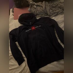 The north face women’s navy blue hoodie